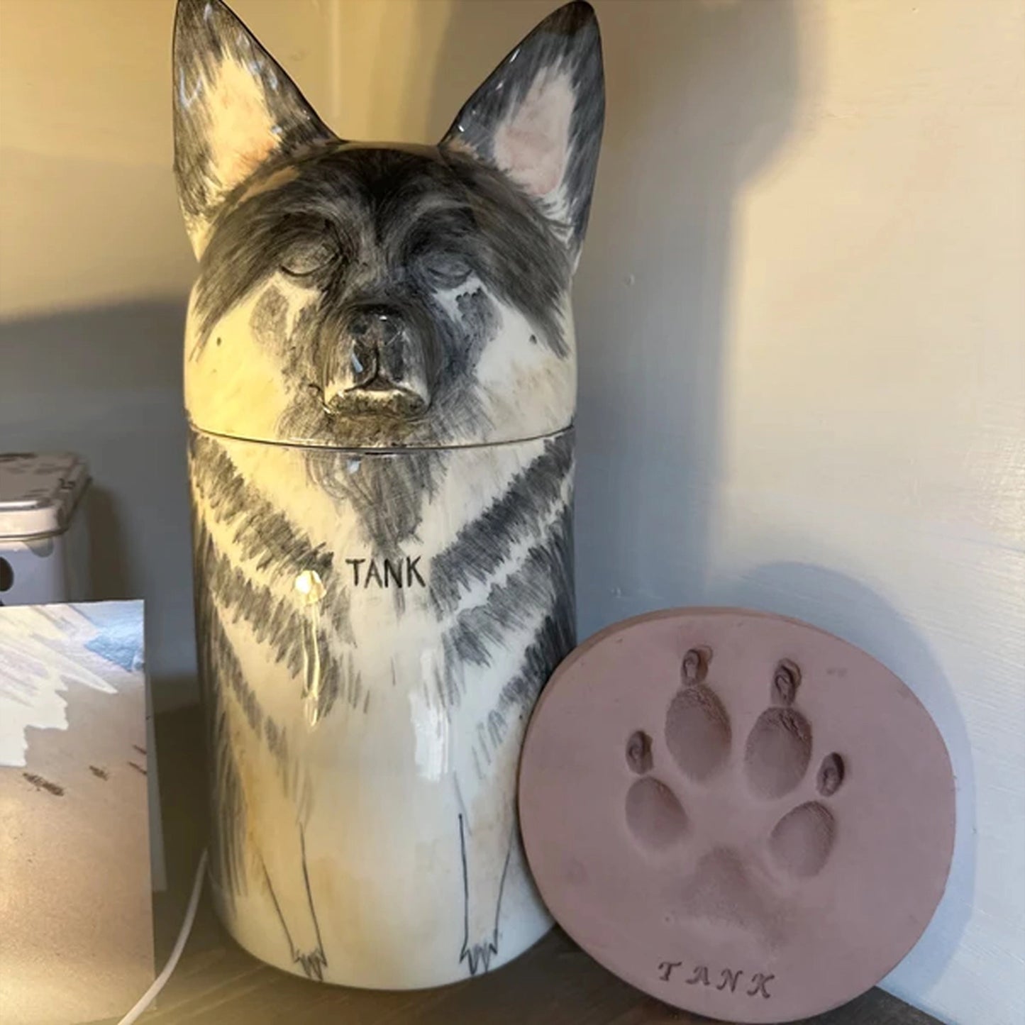 Personalized ceramic pet urn, a one-of-a-kind tribute to your cherished pet.